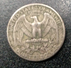 1977 Quarter coin (back)